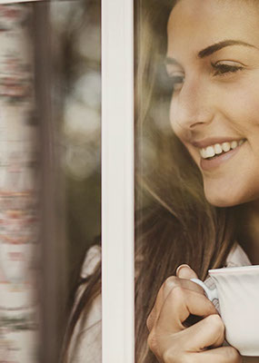 Gillett Dental Care patient drinking coffee