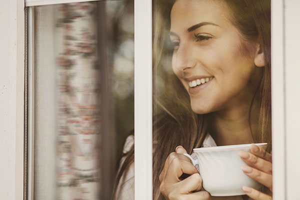 Gillett Dental Care patient drinking coffee