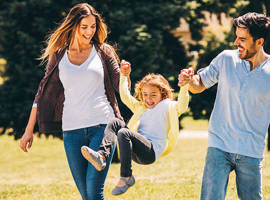 Young family with beautiful smiles in Gillett WI