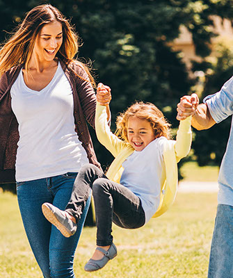 Young family with beautiful smiles in Gillett WI